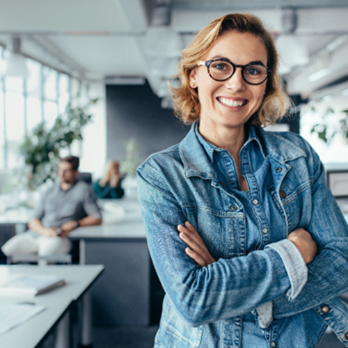Woman smiling at work with confidence