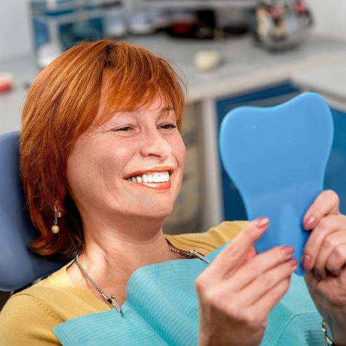 Woman showing off her complete smile