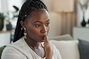 Closeup of woman biting her nails